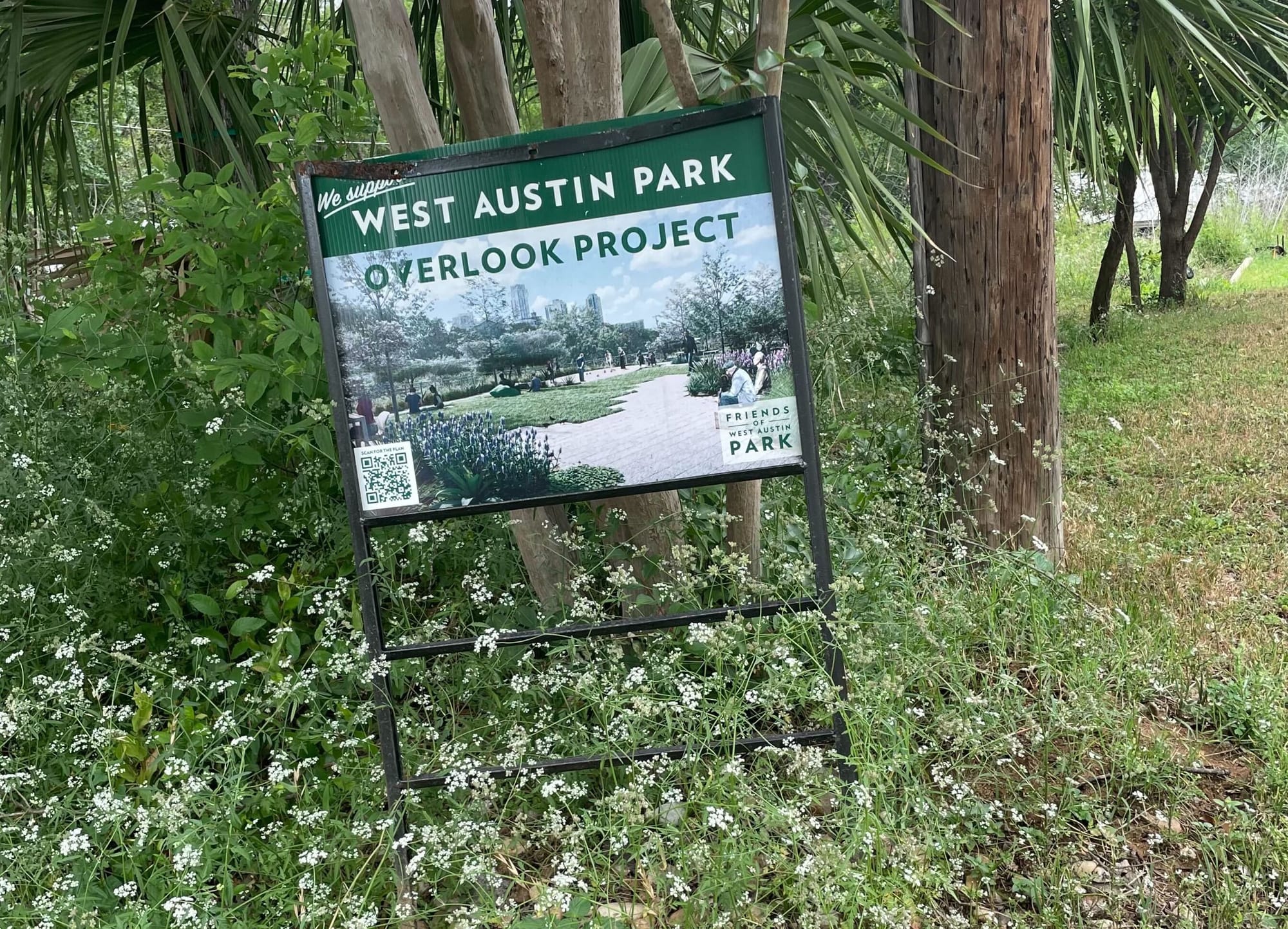 A  yard sign reading: "We support West Austin Park Overlook Project"